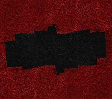 Kara delik ile kırmızı duvar