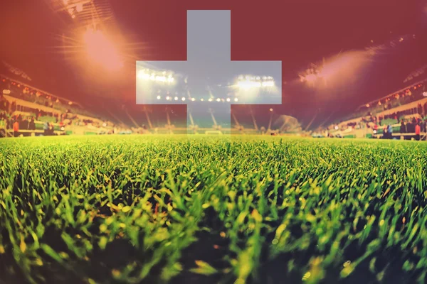 İsviçre bayrağı harmanlama ile euro 2016 Stadyumu — Stok fotoğraf