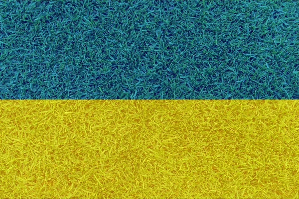 Football field textured by Ukraine national flags on euro 2016 — Stock Photo, Image