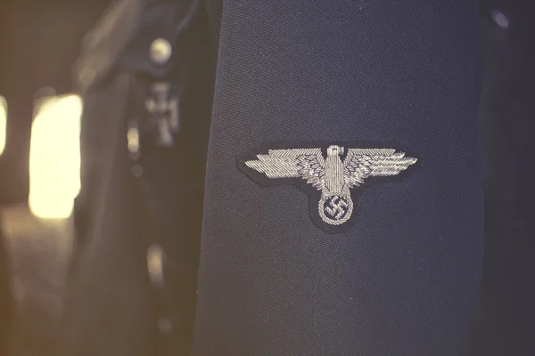 Nazi symbol on uniform — Stock Photo, Image