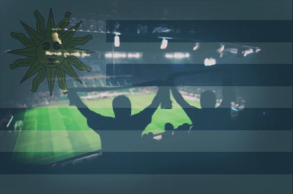 Sport stadion fanów i mieszania flaga Urugwaju — Zdjęcie stockowe