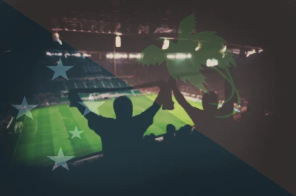 Stadion med fans och blandning Papua Nya Gwinea flagga — Stockfoto