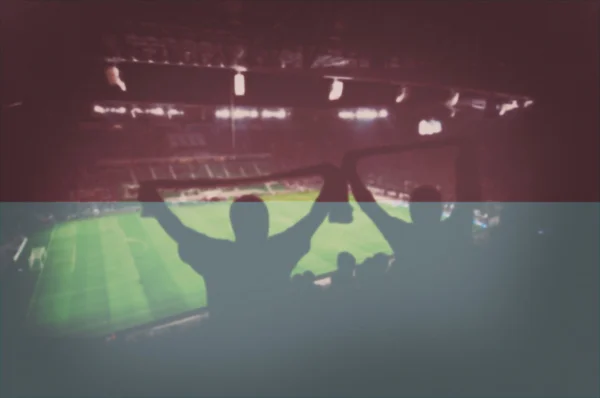 Estadio deportivo con aficionados y mezcla de bandera de Indonesia — Foto de Stock