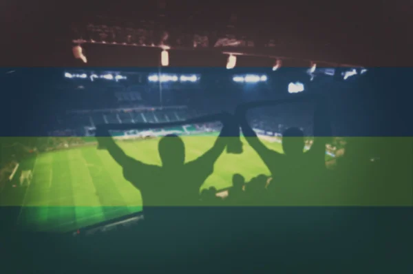 Sport stadion fanów i mieszania flagi Mauritus — Zdjęcie stockowe