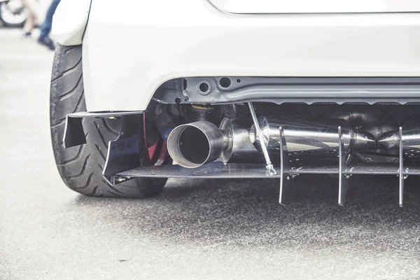 Exhaust pipes of a modern sports car — Stock Photo, Image