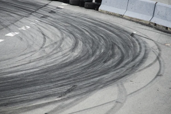 Tyre burnout marks on asphalt road — Stock Photo, Image