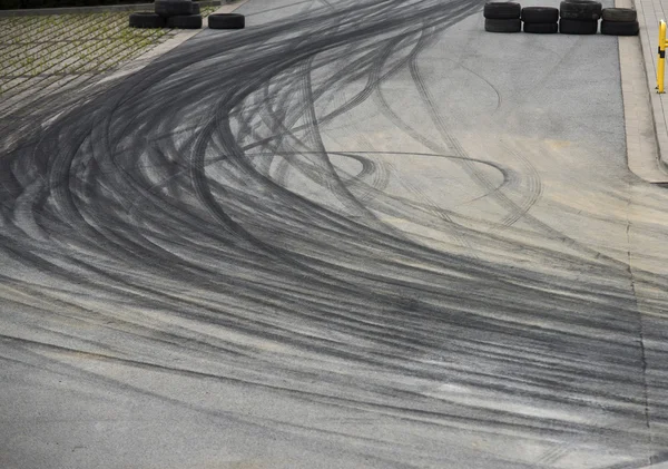 Tyre burnout marks on asphalt road — Stock Photo, Image