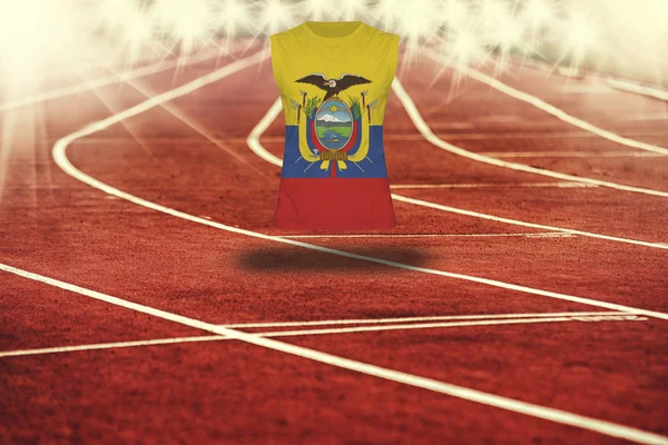Red running track with lines and Ecuador flag on shirt — Stock Photo, Image
