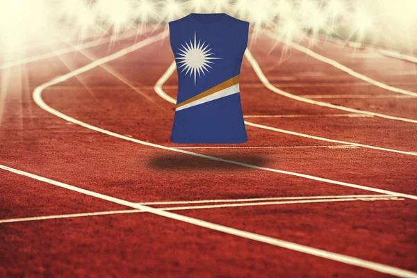 Red running track with lines and Marshall Islands flag on shirt — Stock Photo, Image