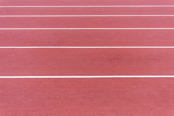 Close up on running track, athletic bacground — Stock Photo, Image