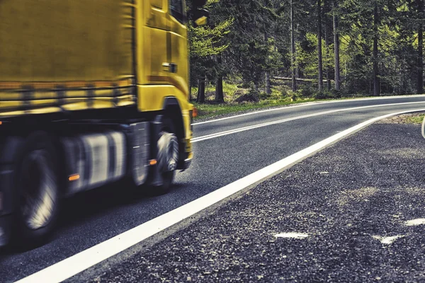 Motion blurred highway in forest, hdr effect — Stock Photo, Image