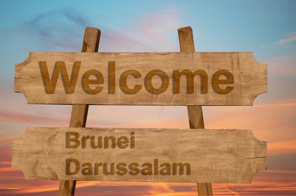 Bem-vindo ao Brunei Darussalam cantar em fundo de madeira — Fotografia de Stock