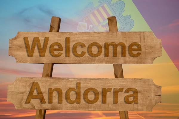 Bienvenido a Andorra cantar sobre fondo de madera con la mezcla de la bandera nacional — Foto de Stock