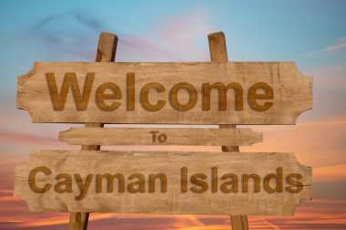 Cayman Adaları şarkı ahşap arka plan üzerinde hoş geldiniz