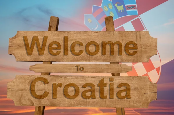 欢迎来到克罗地亚唱上木背景配国旗 — 图库照片