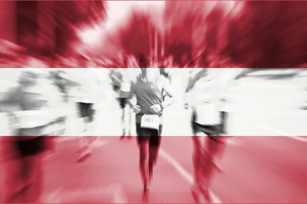 Marathon runner motion blur con la mezcla de la bandera de Austria —  Fotos de Stock