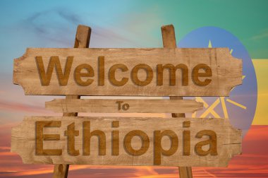 Etiyopya hoş geldiniz şarkı ulusal bayrak harmanlama ile ahşap arka plan üzerinde