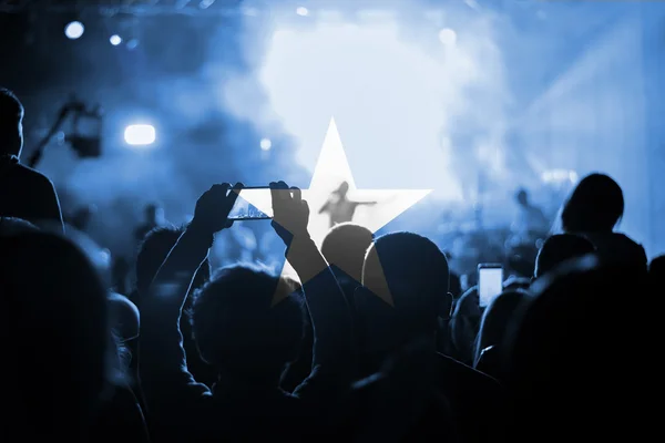 live music concert with blending Somalia  flag on fans