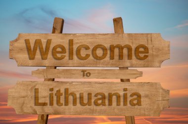 Litvanya işareti ahşap arka plan üzerinde hoş geldiniz