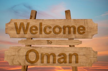 Umman işareti ahşap arka plan üzerinde hoş geldiniz 