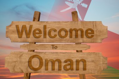 Umman işaret nationa harmanlama ile ahşap arka plan üstünde hoş geldiniz