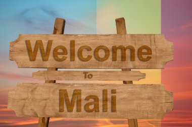 Mali işaret nationa harmanlama ile ahşap arka plan üstünde hoş geldiniz