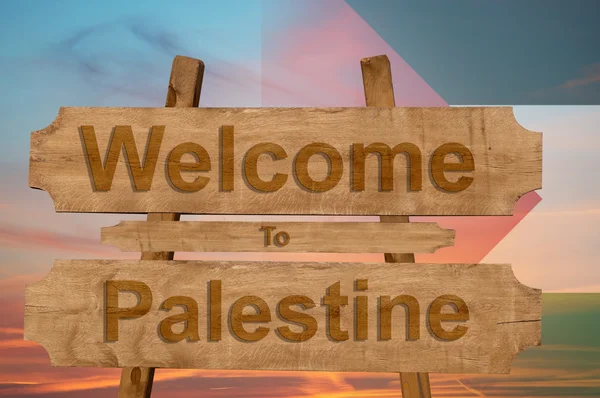 Bem-vindo ao sinal da Palestina sobre fundo de madeira com bandeira nacional de mistura — Fotografia de Stock