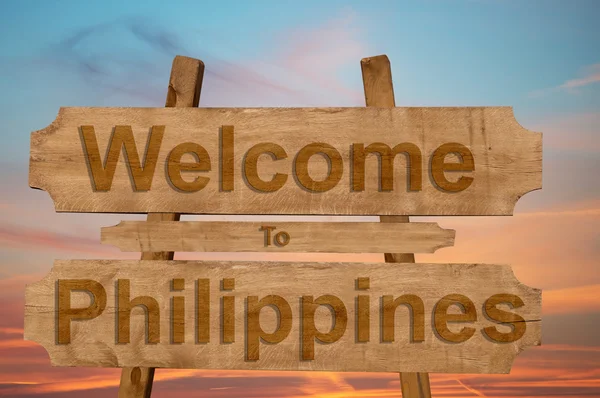 Welcome to Philippines sign on wood background — Stock Photo, Image