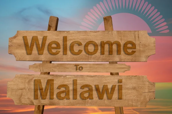 Benvenuti in Malawi segno su sfondo di legno con miscelazione nationa — Foto Stock