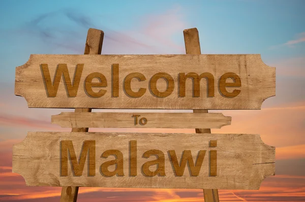 Bem-vindo ao sinal do Malawi no fundo de madeira — Fotografia de Stock