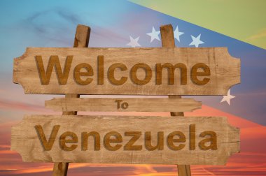 Venezuela hoş geldiniz şarkı ulusal bayrak harmanlama ile ahşap arka plan üzerinde