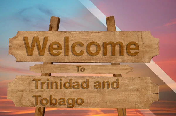 Willkommen in Trinidad und Tobago singen auf Holz Hintergrund mit Blending Nationalflagge — Stockfoto