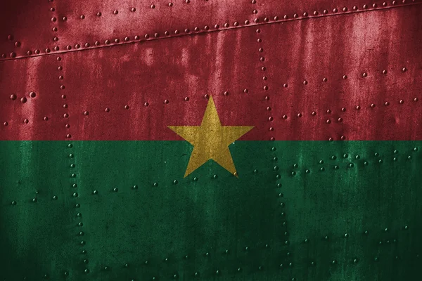 Texutre de metal o fondo con bandera de Burkina Faso — Foto de Stock