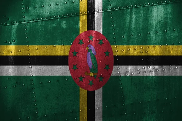 Metallstruktur oder Hintergrund mit Dominica-Flagge — Stockfoto
