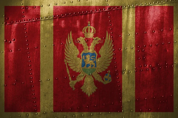 Texutre de metal ou fundo com bandeira Montenegro — Fotografia de Stock