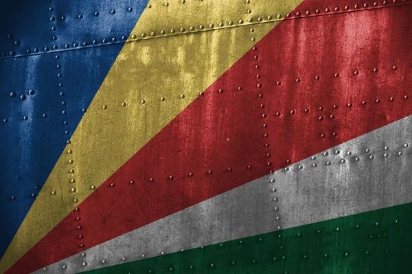 Texutre metallo o sfondo con bandiera Seychelles — Foto Stock