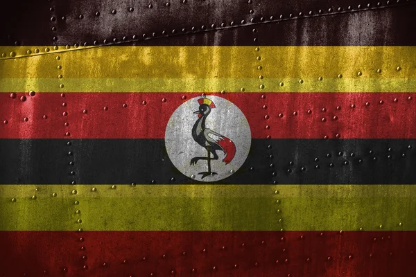 Texutre de metal ou fundo com bandeira de Uganda — Fotografia de Stock