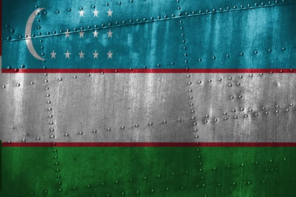 Metal texutre or background with Uzbekistan flag — Stock Photo, Image