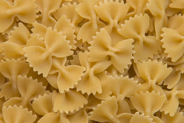 Primer plano de la pasta italiana cruda - farfalle — Foto de Stock