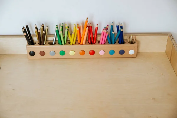 Colored Pencils Container Wooden Table Royalty Free Stock Photos