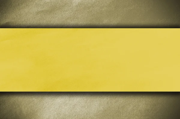 Yellow papper on gold background — Stock Photo, Image