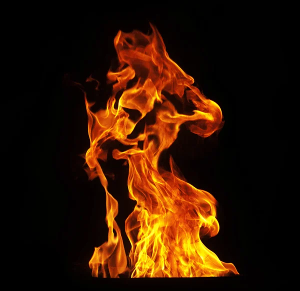 Fire flames on black background — Stock Photo, Image