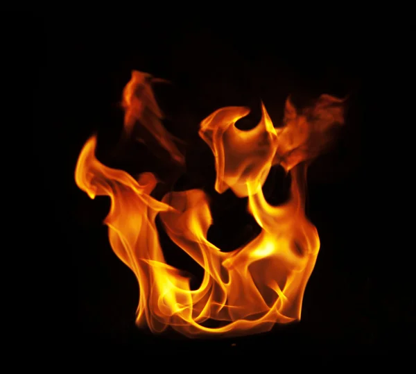 Fire flames on black background — Stock Photo, Image