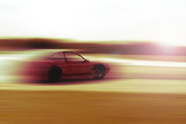 Drift car motion blur sunrise or sunset — Stock Photo, Image