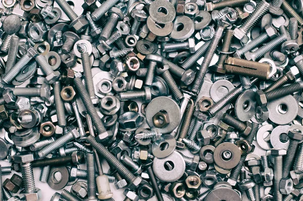 Background of many screws — Stock Photo, Image