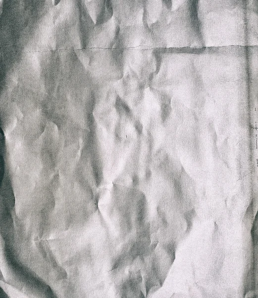 Zmačkaný bílý papír pozadí — Stock fotografie