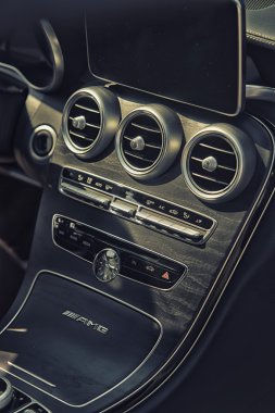 Sleza, Poland, August 15, 2015: Close upMercedes AMG steering wheel and cockpit on Motorclassic show on August 15, 2015 in the Poland