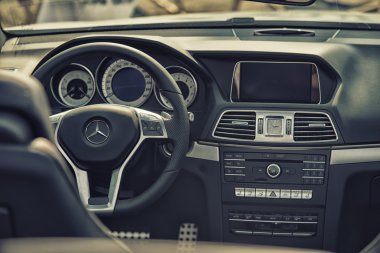 Sleza, Poland, August 15, 2015: Close upMercedes AMG steering wheel and cockpit on Motorclassic show on August 15, 2015 in the Poland