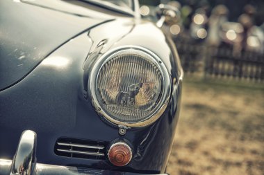 Sleza, Poland, August 15, 2015: Close up on Porsche  vintage car and lights on  Motorclassic show on August 15, 2015 in the Poland