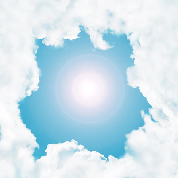 Quadro - nuvens brancas no céu azul e sol — Fotografia de Stock